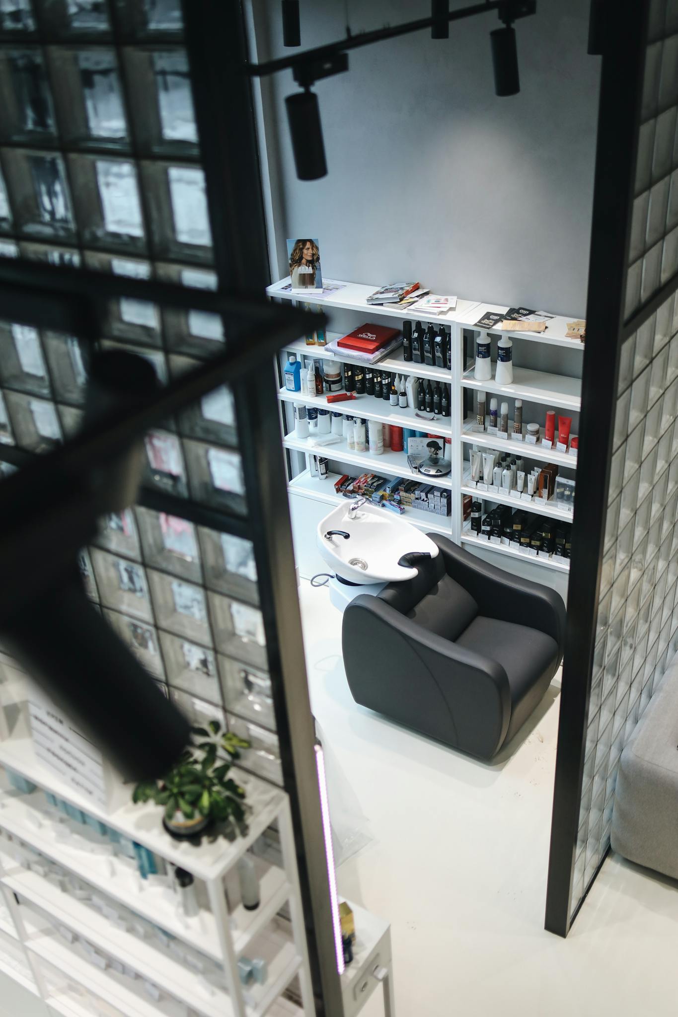 Stylish hair salon interior showcasing a contemporary design and professional equipment.